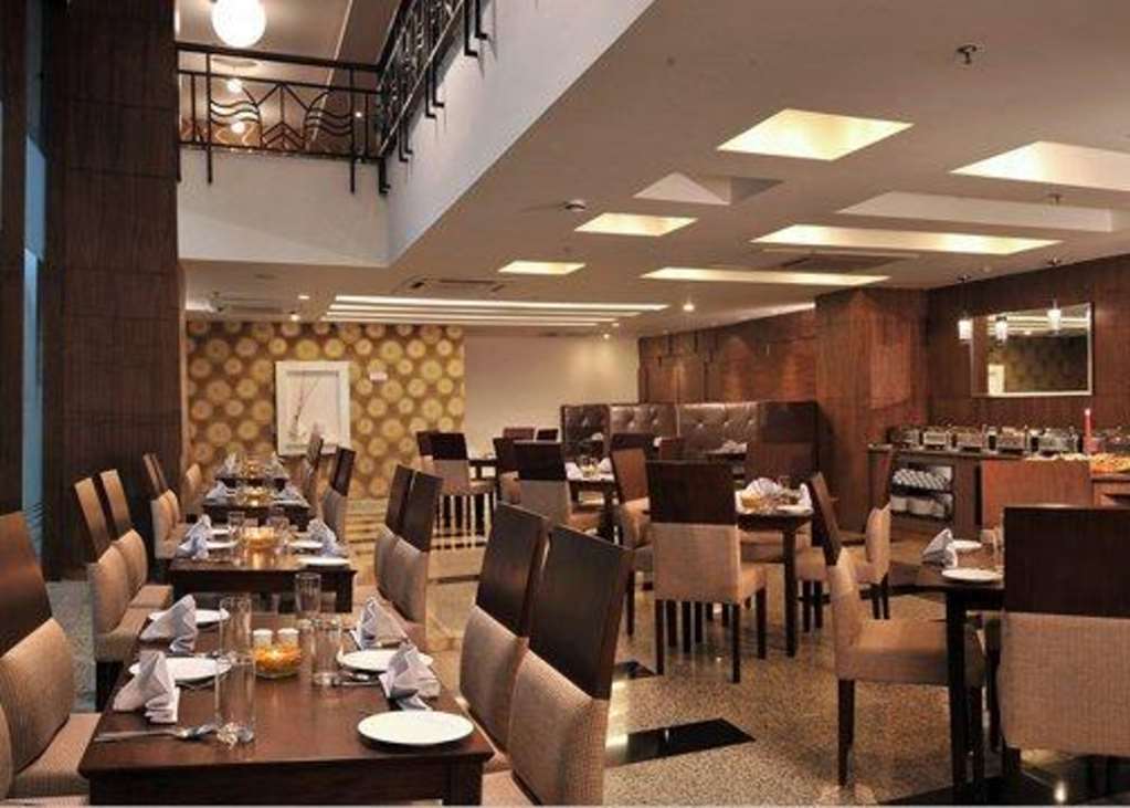 Comfort Inn Tulip Heights Батинда Ресторант снимка